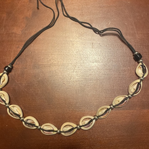 Vintage cowrie shell necklace on black cord. About 25 inches Can use as choker - Picture 2 of 4
